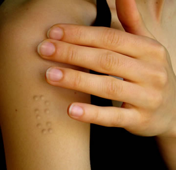 cutting tattoo. (Blind braille haptic tattoo